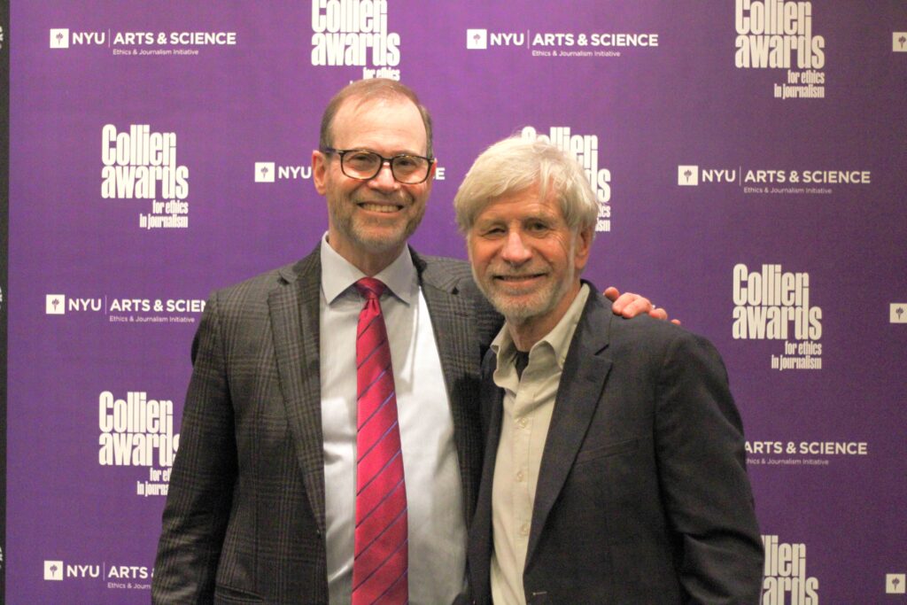 Pictured: Nathan S. Collier posing with Stephen J. Adler